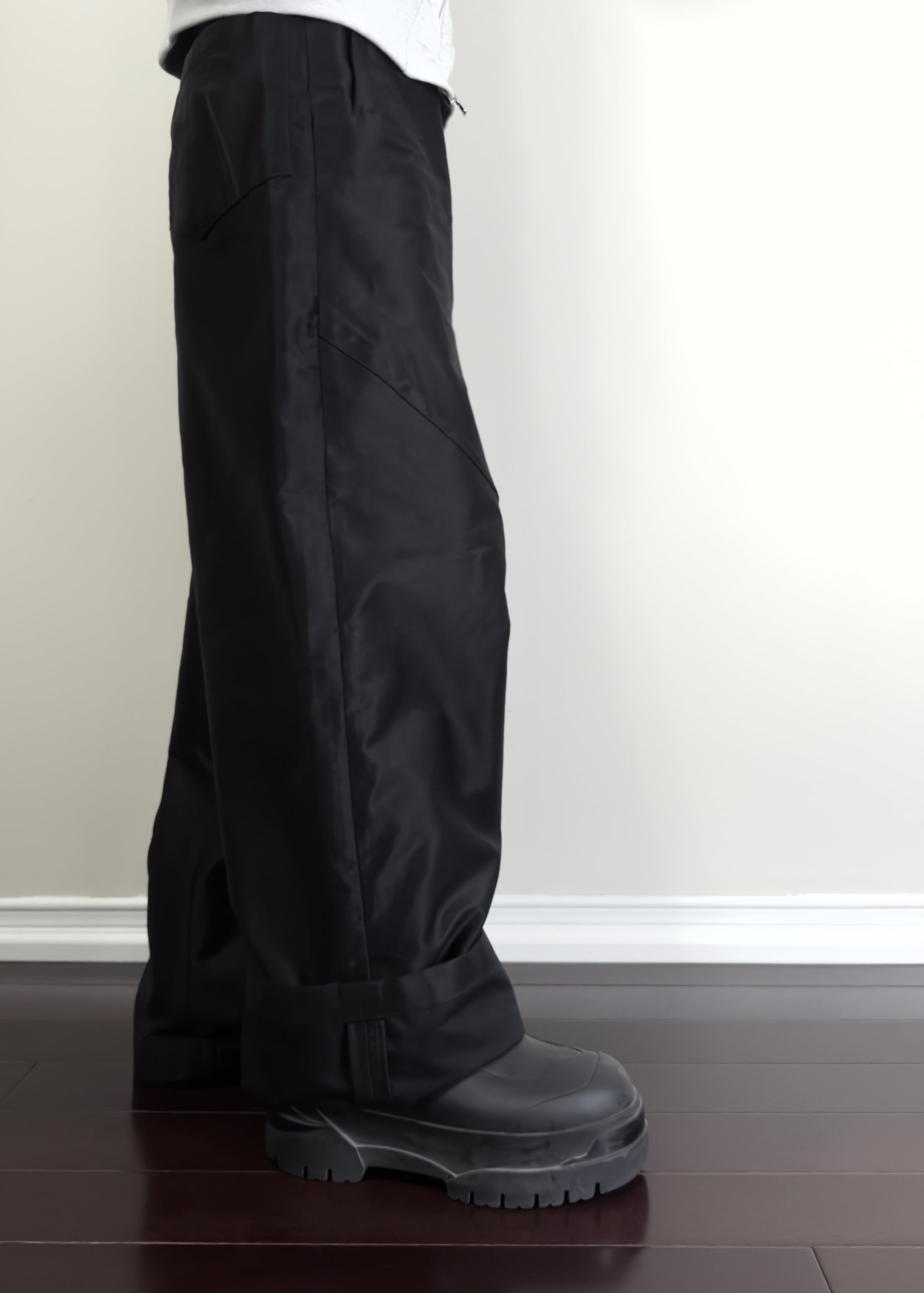 NEVER STRUGGLED DARTED TROUSERS ON BODY, SIDE VIEW, CUFFED WITH BIAS TAPE DETAILING, KNEE DART, BACK POCKET DART, L SHAPED FRONT POCKETS, JAPANESE HEAVYWEIGHT MOLESKIN FABRIC 100% COTTON